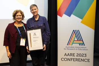 AARE President Prof Julie Mcleod Presenting the Radford Lecture Award to Professor Mary Lou Rasmussen ANU